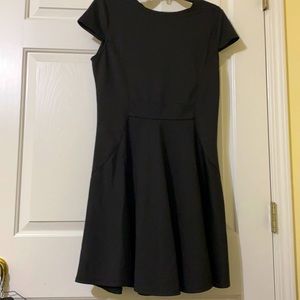 Black mid-dress with gold zipper